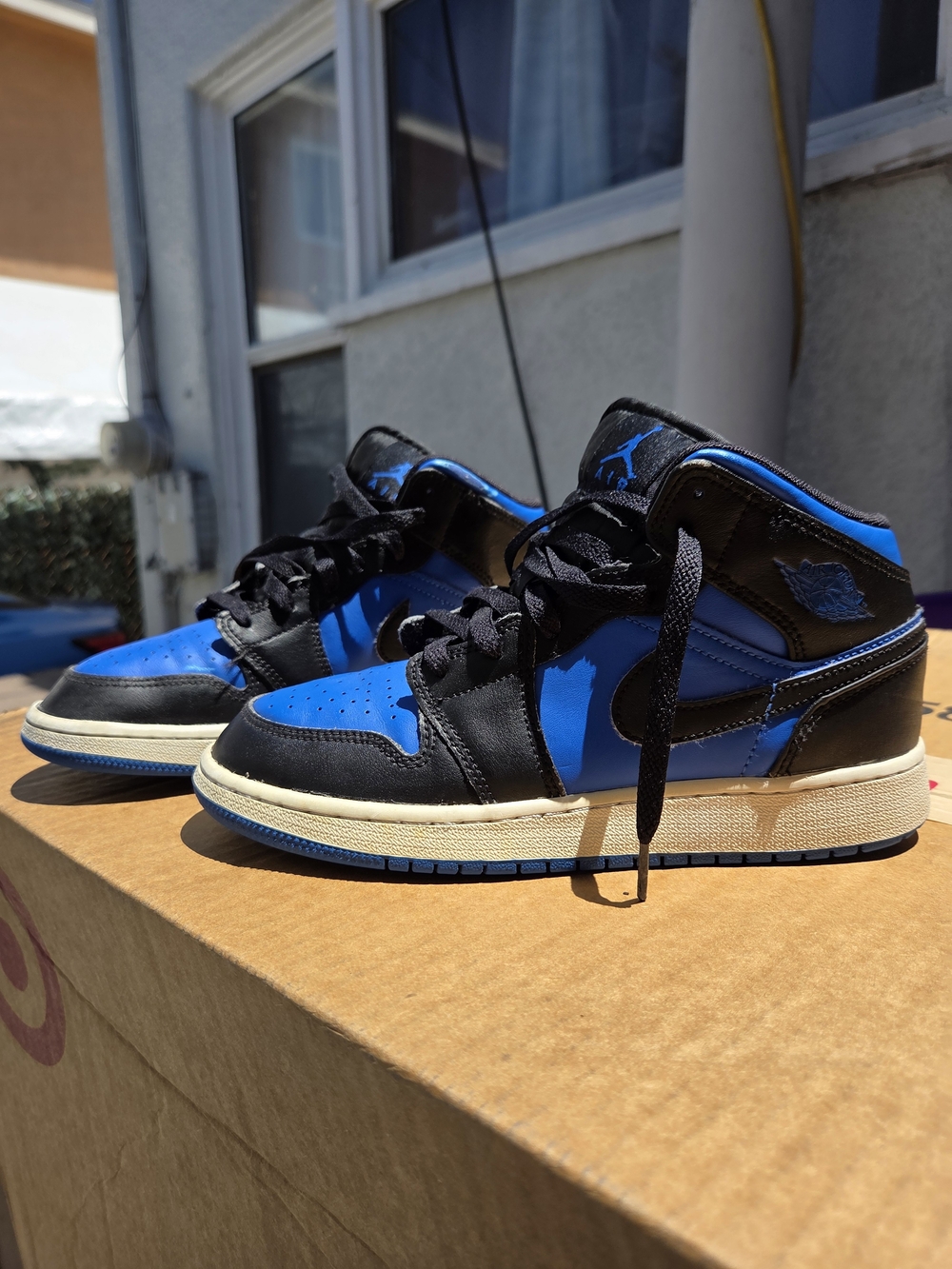 Jordan Retro High-Top Sneakers in Black and Royal Blue Youth 5